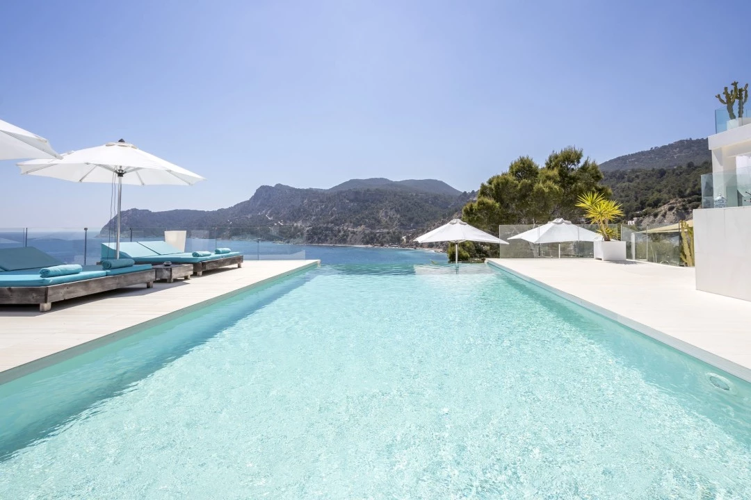 1681216751-Luxury real estates Ibiza to rent villa Raya Main pool 1.webp